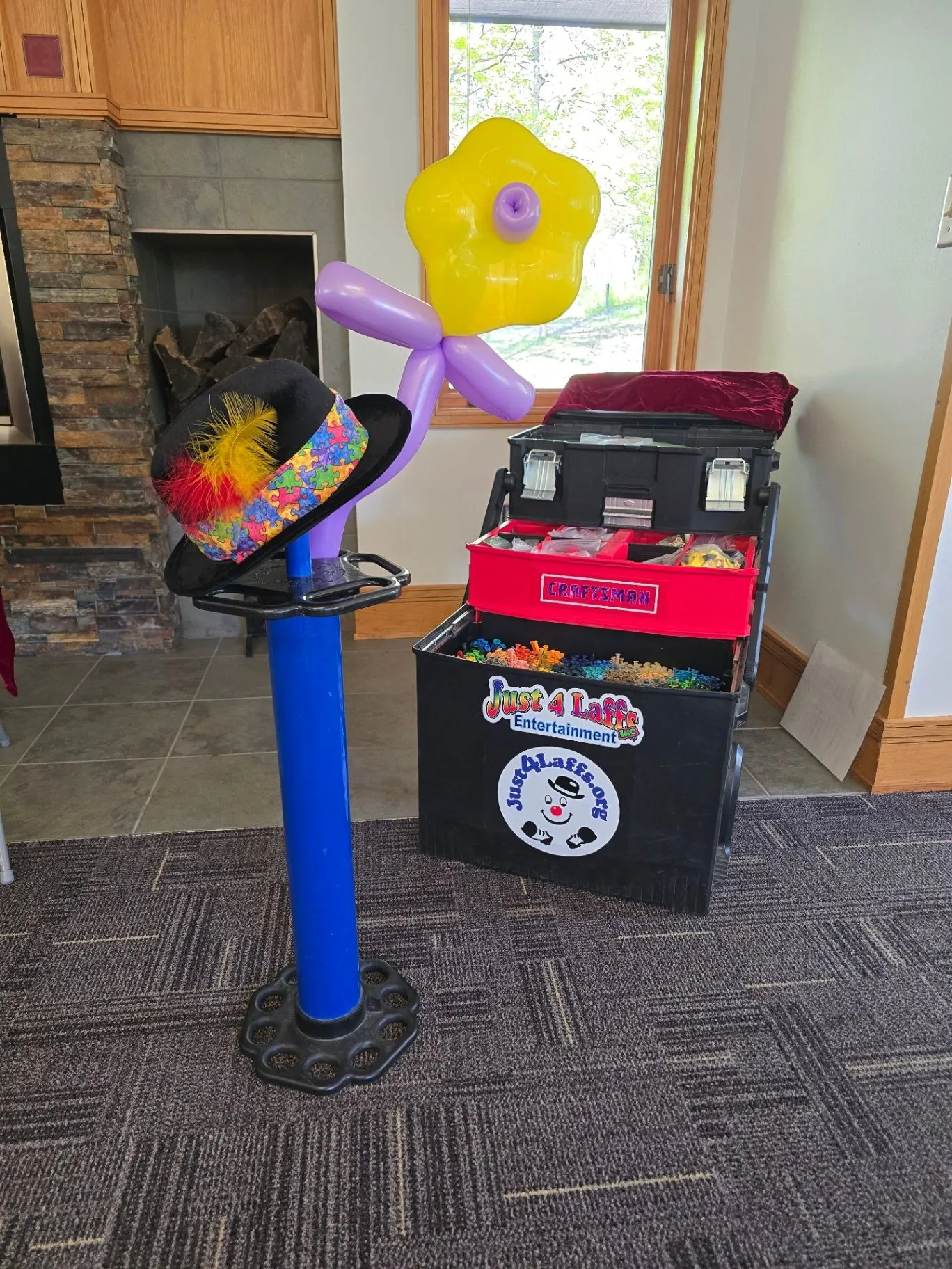 Colorful balloon flower and balloon supplies ready for a family event